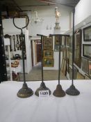 4 Victorian / Edwardian Brass Shop Display Stands, one with iron base