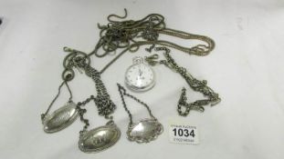 A Grand Prix pocket watch, watch chains and 3 decanter labels