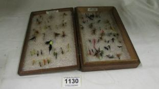 A quantity of fishing flies in wooden case