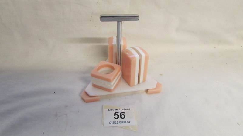 A retro pink and white cruet set