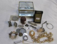 A mixed lot of costume jewellery including silver St. Christopher, pewter animals, coins etc