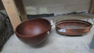 A copper dish and a vintage wooden bowl