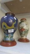 An Oriental vase and a Cloisonne vase, both with drilled holes for lamp conversion