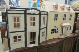 2 wooden dolls houses