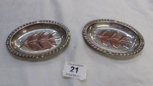 A pair of silver plate on copper tradesmen's samples of meat platters by Viking Plate