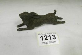 A bronze reclining hare