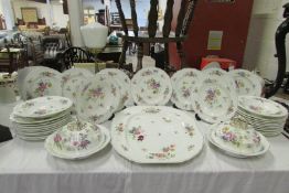 Approximately 30 pieces of floral decorated dinnerware