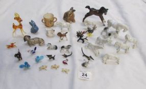 A mixed lot of miniature animals including Beswick, glass etc