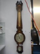 A Huger inlaid barometer, made in Germany