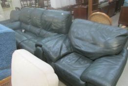 A green leather 3 piece suite with recliners