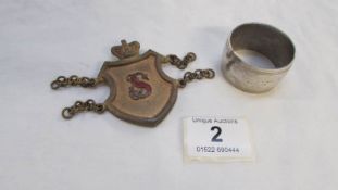 A Masonic silver plated napkin ring dated 1949 and inscribed 6289 Lodge together with a gilt metal