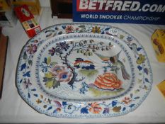 Large meat dish with gravy well, marked Stone China