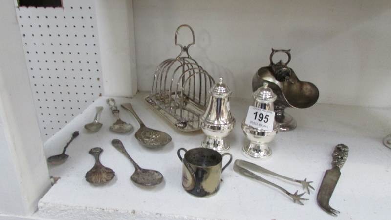 A mixed lot of silver plate including toast rack, sugar hod, cruet etc