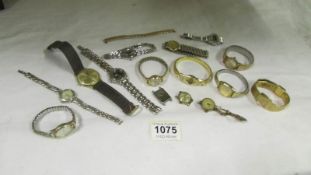 A mixed lot of ladies and gent's wristwatches some working, others for spares or repair