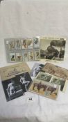 A mixed lot including cigarette cards, nude postcards, railway EP record etc
