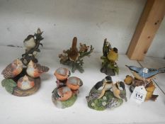 A collection of bird figurines