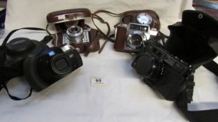4 vintage camera's including Samsung and Yashica
