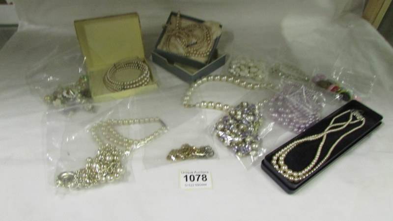 A mixed lot of costume jewellery including pearls