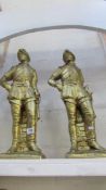 A pair of tall gilded figures of Roundheads
