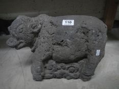 A 14th century volcanic rock cow