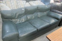 A green leather sofa