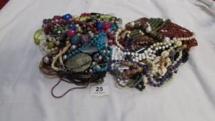 A mixed lot of costume jewellery including necklaces