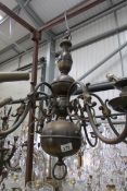 An old brass ceiling light for restoration