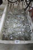A large box of glass chandelier droppers