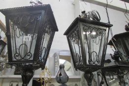 A pair of wall mounting lamps with brackets