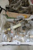 Several boxes of glass chandelier arms and wall lights