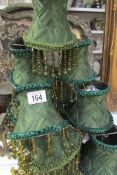 A quantity of green fabric lamp shades