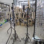 A pair of wrought iron lamp stands for restoration