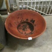 A large terracotta bowl