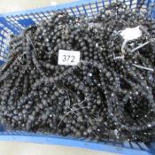 A box of black bead droppers