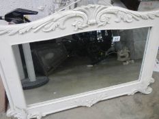 A white painted 'shabby chique' mirror