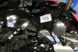 A basket of black glass chandelier droppers