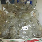 A large box of glass dishes