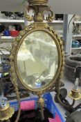A French style oval mirror