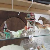 A mixed lot of china animals, one shelf