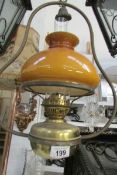A hanging oil lamp