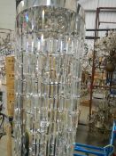 A chrome a glass chandelier for restoration