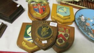 A quantity of Heraldic crests