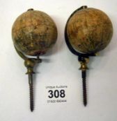 A pair of J.L & Co Masonic column globes