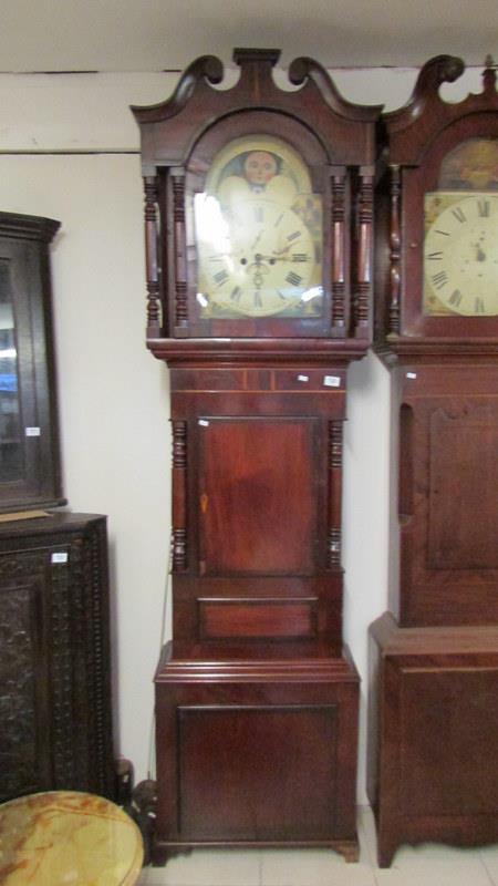 A mahogany 8 day Grandfather clock with mood phase dial