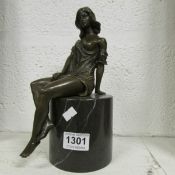 A bronze semi nude figure