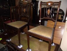 A pair of inlaid chairs