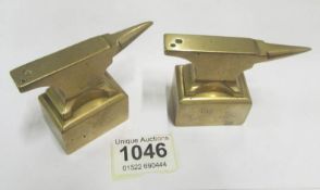 A pair of bronze watchmaker's? anvils
