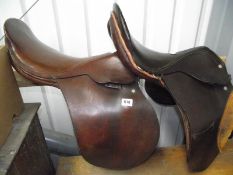 2 leather saddles