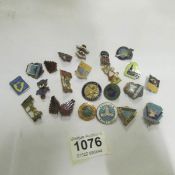 A collection of Butlin's badges including rare 1940's issue