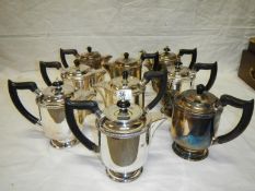 8 silver plate water jugs